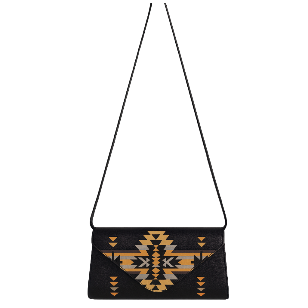 Black handbag with geometric pattern on a white background