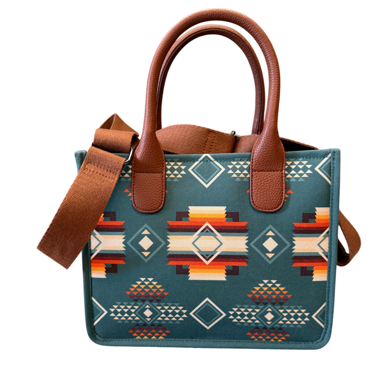 Handbag with brown leather handles and strap, featuring a geometric pattern on a transparent background