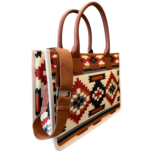 Handbag with tribal pattern and brown handles on a transparent background
