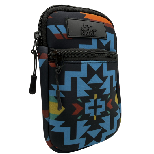 A small Native American-themed pouch with a Southwestern geometric pattern in blue, black, orange, yellow, and red, featuring a black leather brand patch.