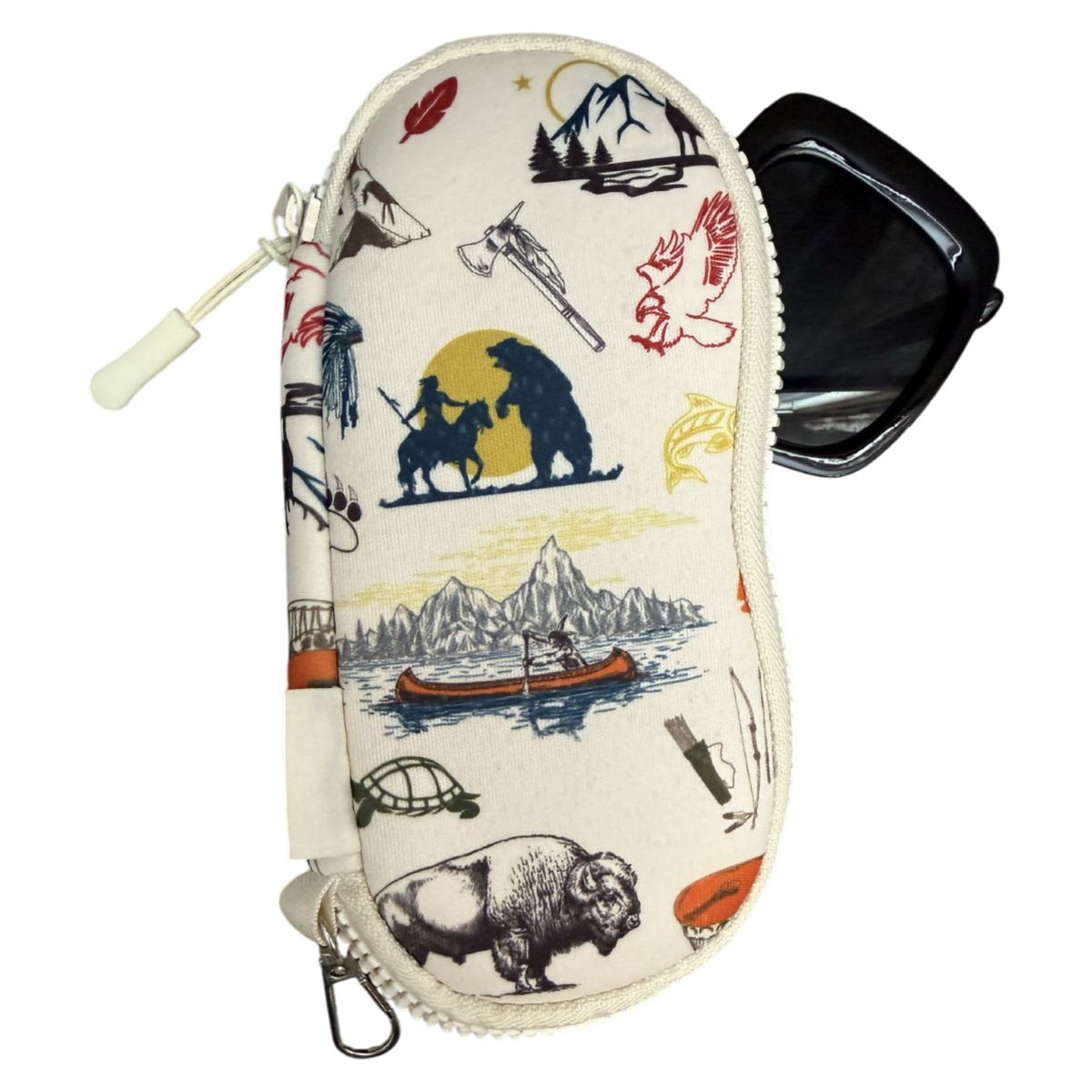 A cream-colored zippered eyeglasses case with a colorful outdoor-themed illustration pattern, shown with a pair of black sunglasses tucked into the side pocket against a white background.