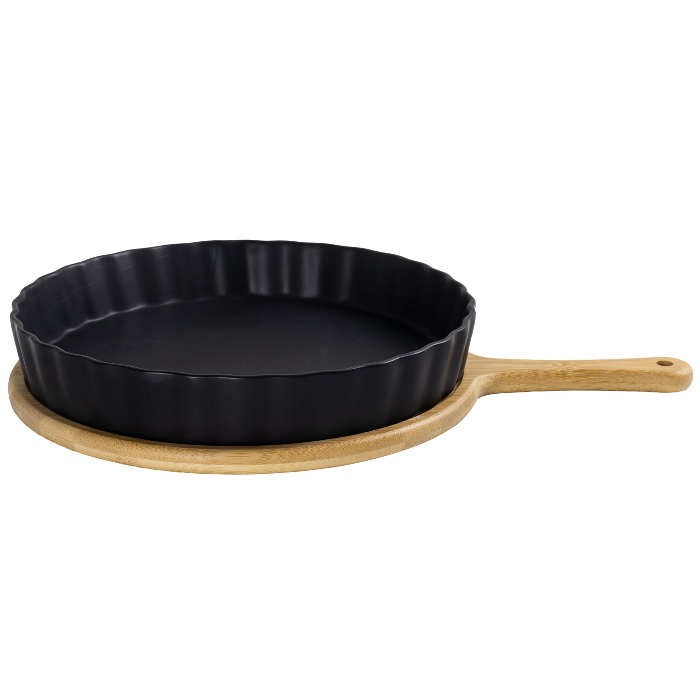 Black cast iron skillet with bamboo holder with handle on a white background