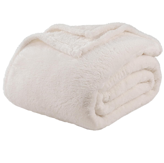 Soft white blanket on a white background