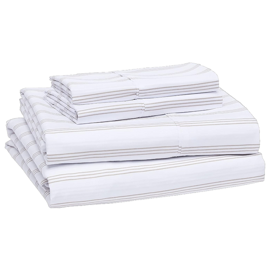 Stack of white folded towels on a white background