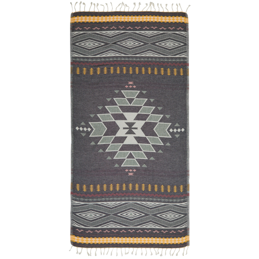 Woven blanket with geometric pattern on a white background