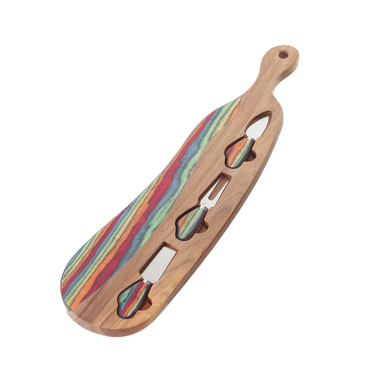 Colorful Wooden cutting board with handle and three utensils on a white background