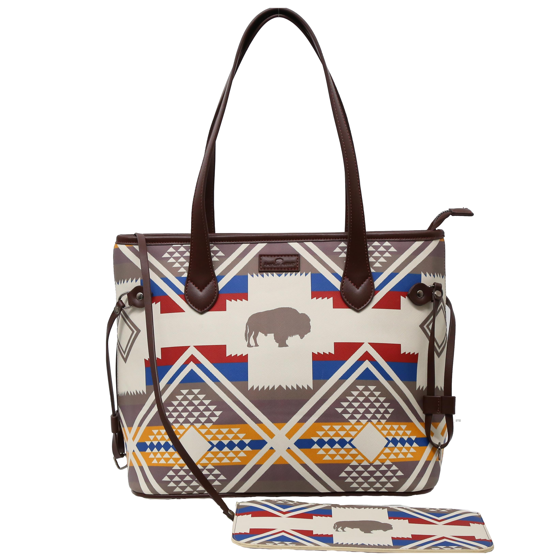 Handbag with geometric pattern and leather accents on a white background