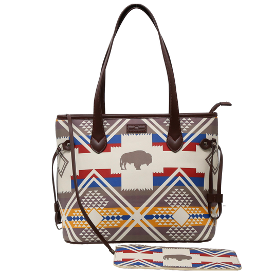 Handbag with geometric pattern and leather accents on a white background