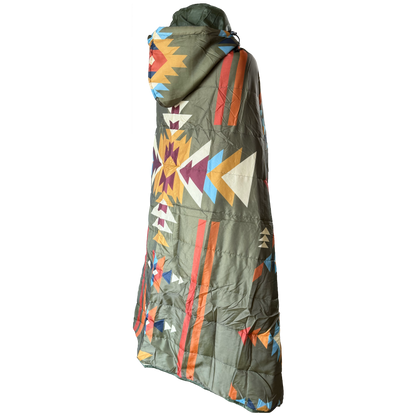 A hooded puffer jacket shown from the back, featuring a muted olive green base with a vibrant Southwestern geometric pattern in orange, red, yellow, blue, and white.