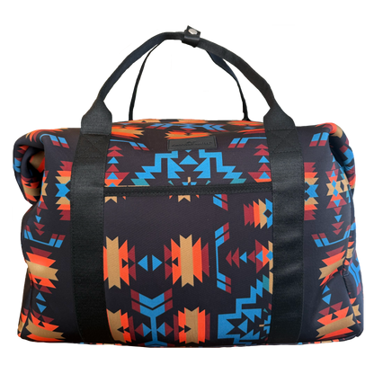 Multicolored patterned duffel bag on a white background