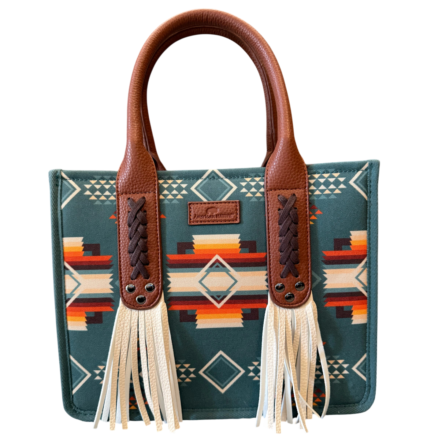Handbag with patterned fabric and brown leather handle on a transparent background