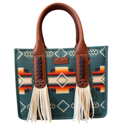 Handbag with patterned fabric and brown leather handle on a transparent background