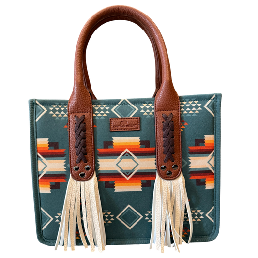 Handbag with patterned fabric and brown leather handle on a transparent background