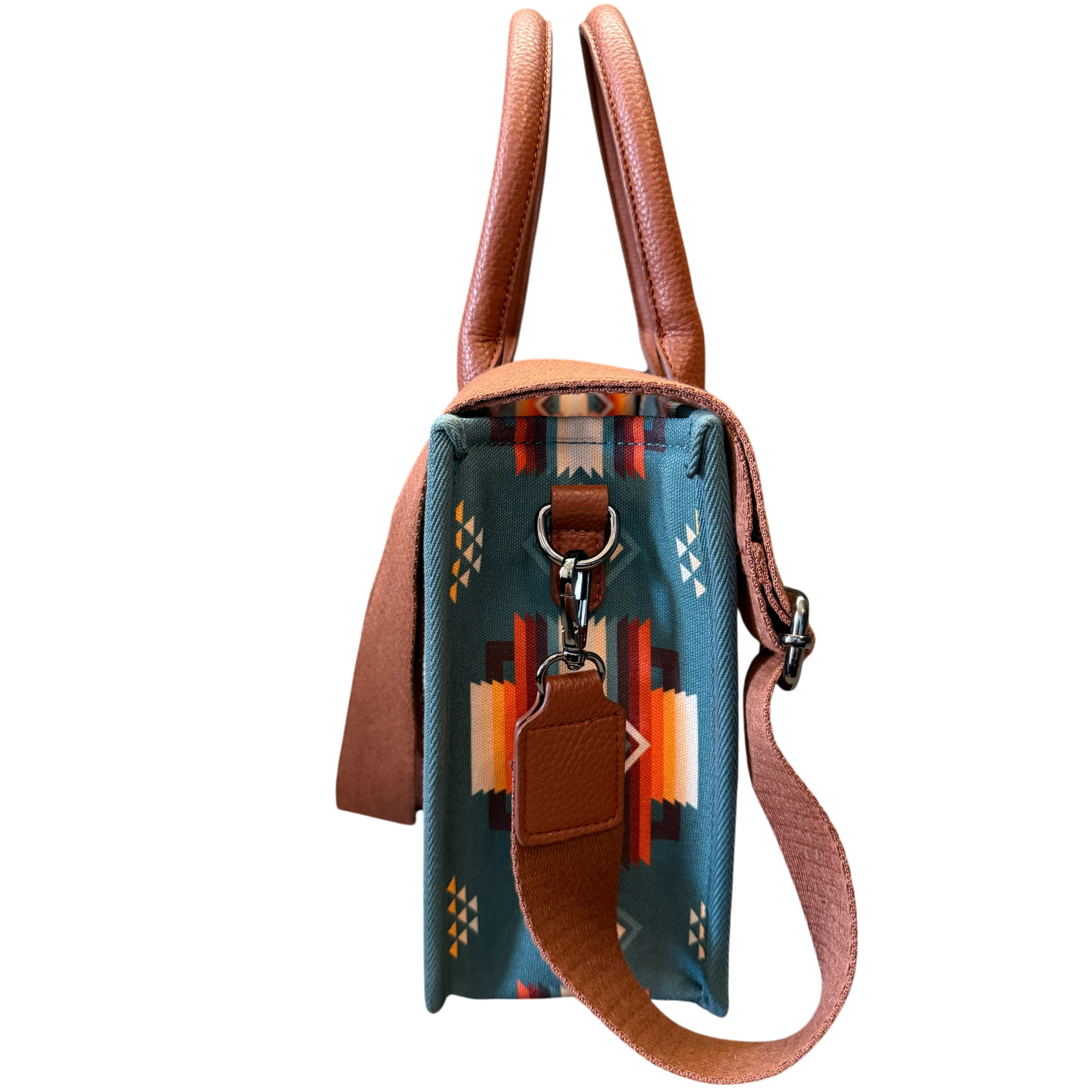 Small blue handbag with brown leather strap and handle on a white background