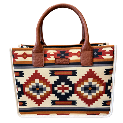 Tote bag with tribal pattern and brown handle on a white background