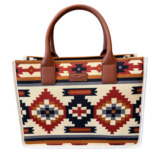 Tote bag with tribal pattern and brown handle on a white background