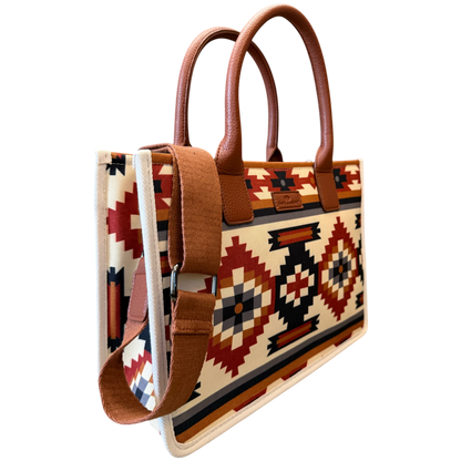 Handbag with tribal pattern and brown handles on a transparent background