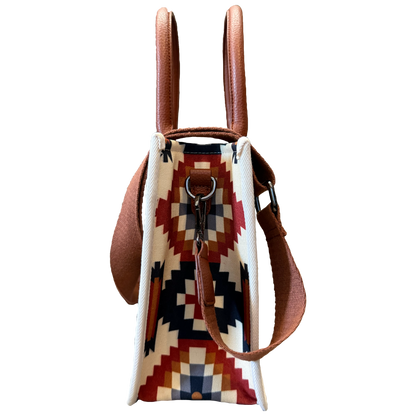 Small backpack with a geometric pattern on a white background