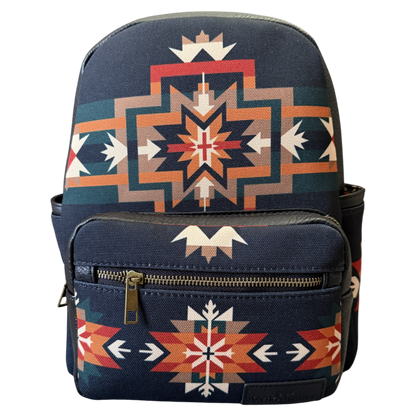 A navy blue backpack featuring a Southwestern geometric pattern in orange, beige, and white, with a front zippered pocket.