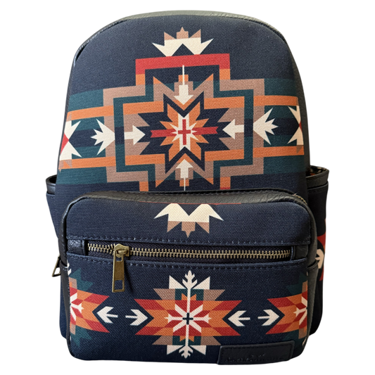 A navy blue backpack featuring a Southwestern geometric pattern in orange, beige, and white, with a front zippered pocket.