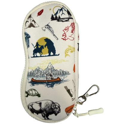 A zippered eyeglasses case with an off-white background and a multicolor outdoor-themed print featuring a bison, canoe, mountains, and fishing gear, complete with a silver carabiner and white rubber band.