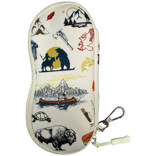 A zippered eyeglasses case with an off-white background and a multicolor outdoor-themed print featuring a bison, canoe, mountains, and fishing gear, complete with a silver carabiner and white rubber band.