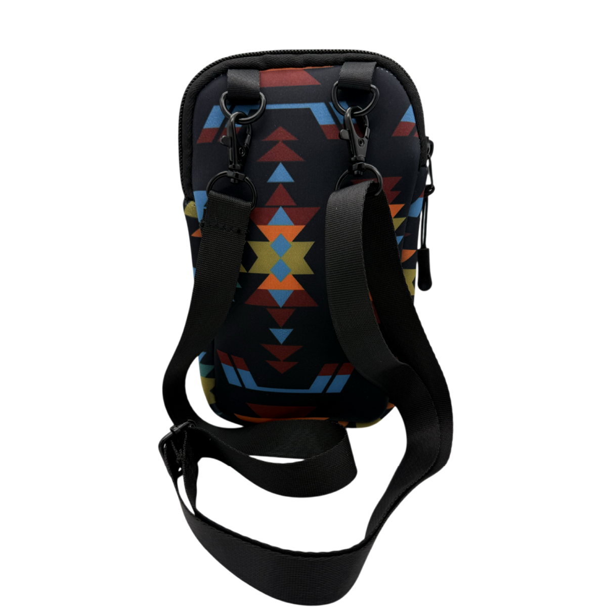 A black crossbody phone bag with a colorful geometric Southwestern-style pattern in blue, red, and yellow, featuring an adjustable black strap and black hardware, shown on a plain white background.