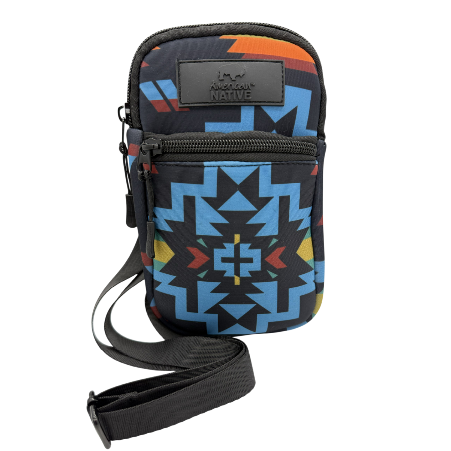 A small crossbody phone bag with a black strap, featuring a colorful geometric Southwestern pattern in blue, orange, yellow, and red on a black background. It has a black leather brand patch on the front that reads 'Lone Star Native'.