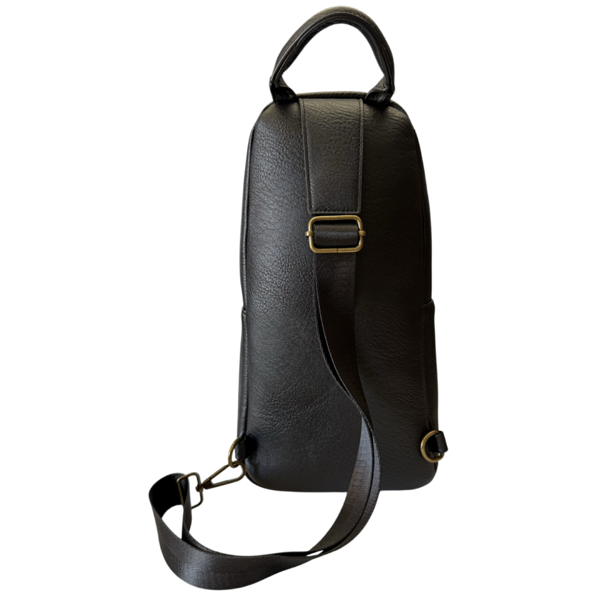A black textured leather shoulder bag shown from the back, featuring a top handle, a long adjustable shoulder strap, and a gold-tone metal buckle.