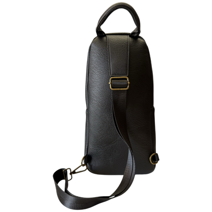 A black textured leather shoulder bag shown from the back, featuring a top handle, a long adjustable shoulder strap, and a gold-tone metal buckle.