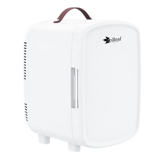 White humidifier with a brown handle on a white background