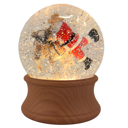 Christmas-themed snow globe with Santa Claus and rbull inside on a white background