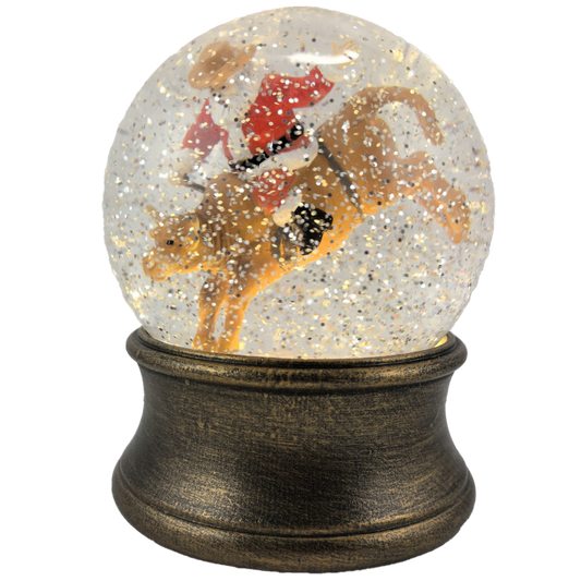 Snow globe with bull and Santa Claus inside on a white background