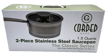Box of Cored Ware 2-piece stainless steel saucepan with glass lid on a white background