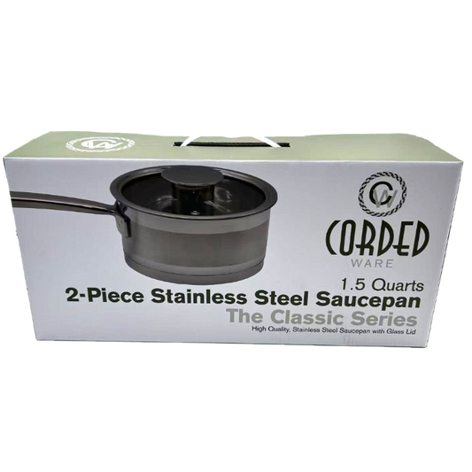Box of Cored Ware 2-piece stainless steel saucepan with glass lid on a white background