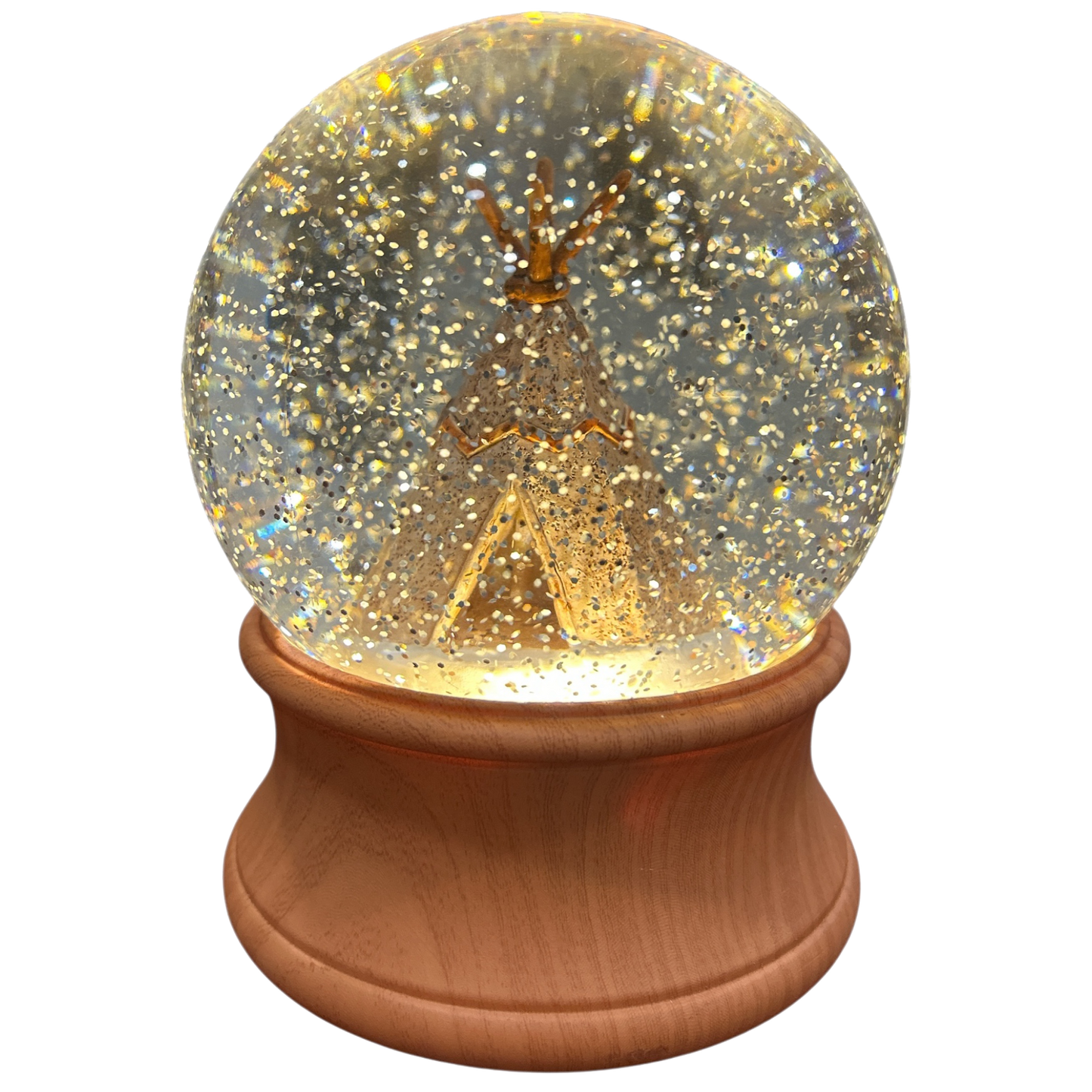 Snow globe with tee pee inside on wooden base on a white background