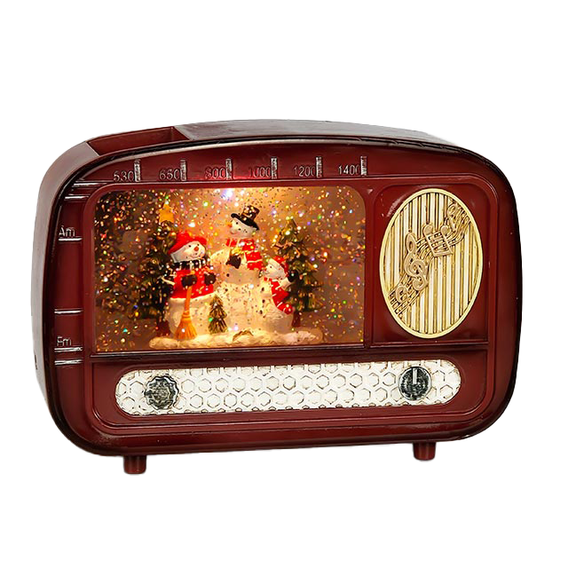 Vintage-style radio with snowman and Christmas tree display on a white background