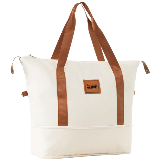White tote bag with brown straps and a visible brand logo on a white background