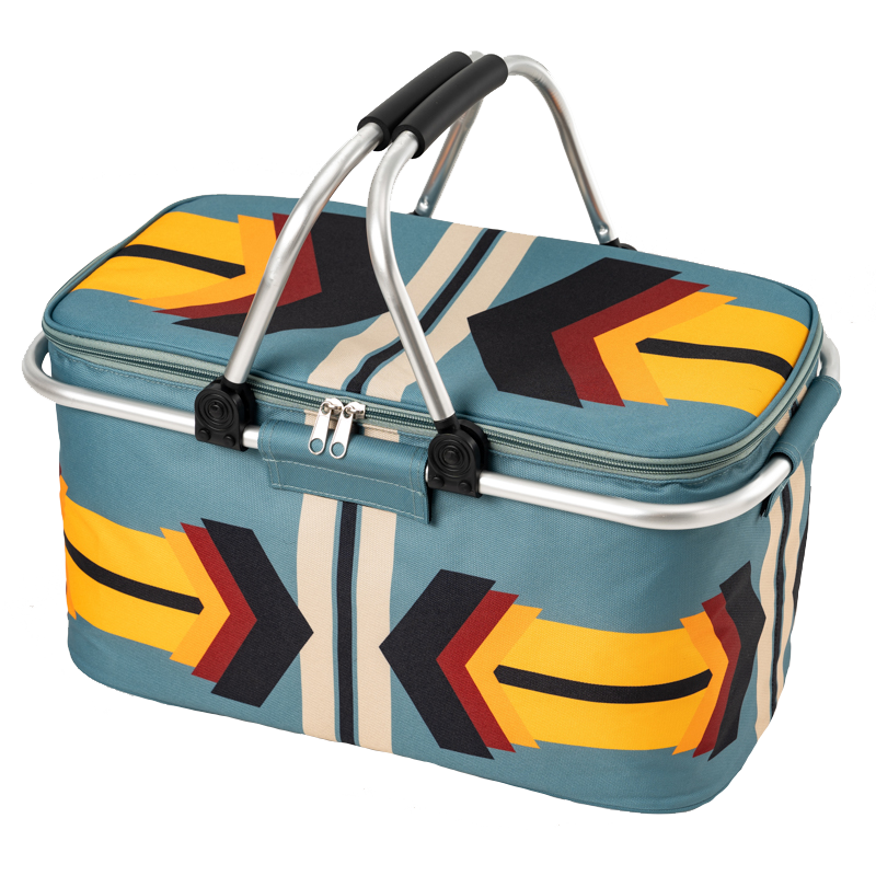 Multicolored patterned picnic basket with handles on a white background
