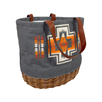 Tote bag with wicker base and tribal design on a white background