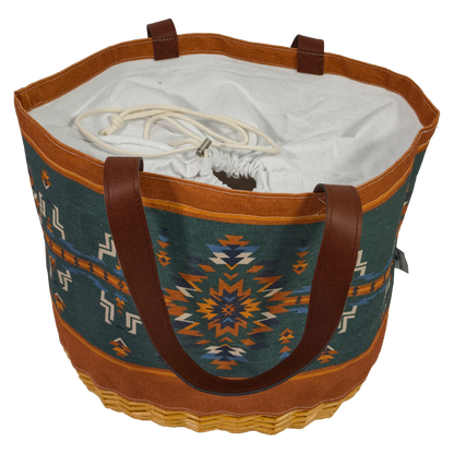 Decorative bag with tribal patterns and brown handles on a white background