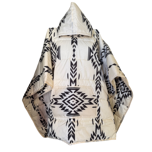 White puffer jacket with black geometric patterns on a white background
