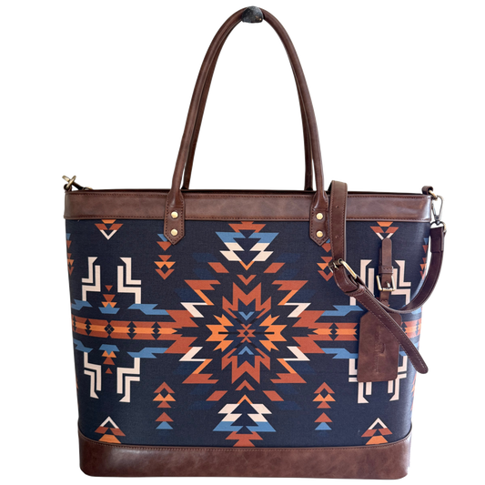 Tote bag with geometric pattern and brown leather accents on a white background